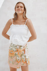 Calypso Wrap Mini Skirt - Yellow Spring Floral